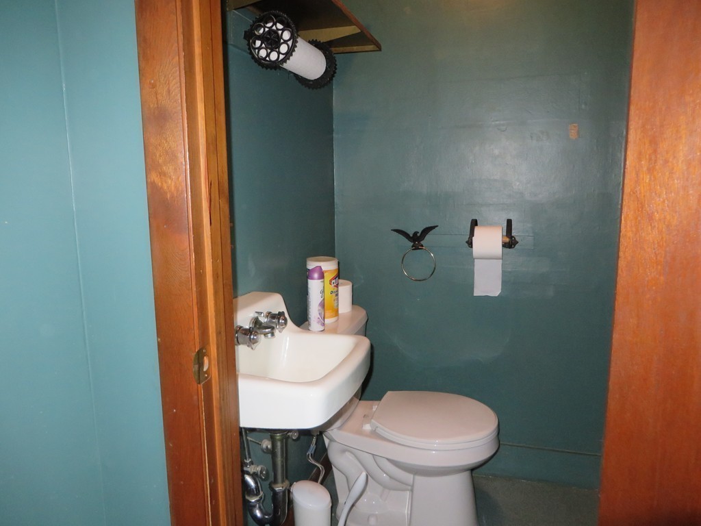 194 Turnpike Road Montague, MA 01351 - Photo 16 of 30 a bathroom with a sink and a toilet