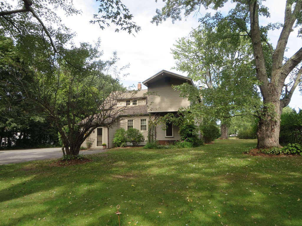 194 Turnpike Road Montague, MA 01351 - Photo 5 of 30 a view of a big yard with large trees