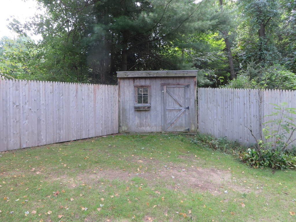 194 Turnpike Road Montague, MA 01351 - Photo 7 of 30 a backyard of a house with lots of green space