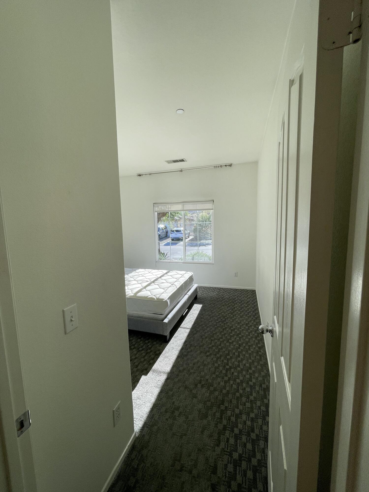 1122 Oro Ridge Palm Springs, CA 92262 - Photo 12 of 33 a bathroom with a granite countertop sink and a toilet