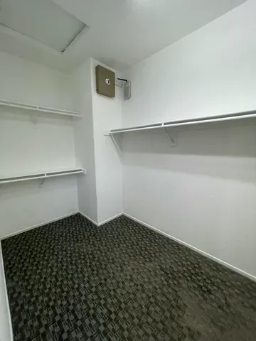 a large kitchen with stainless steel appliances granite countertop a large counter top and stove