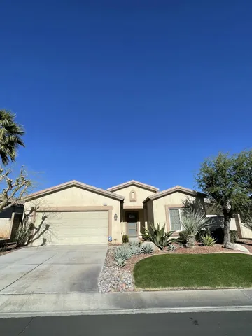 a view of a house with a swimming pool