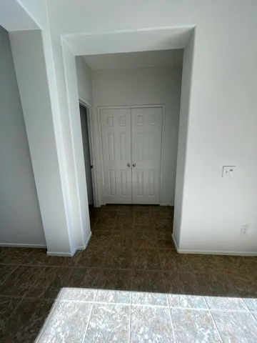 a view of a room with a door