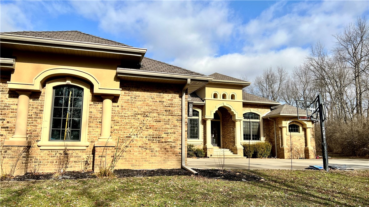 6362 Autumn Ridge Court Decatur, IL 62521 - Photo 37 of 40 a front view of a house with a yard
