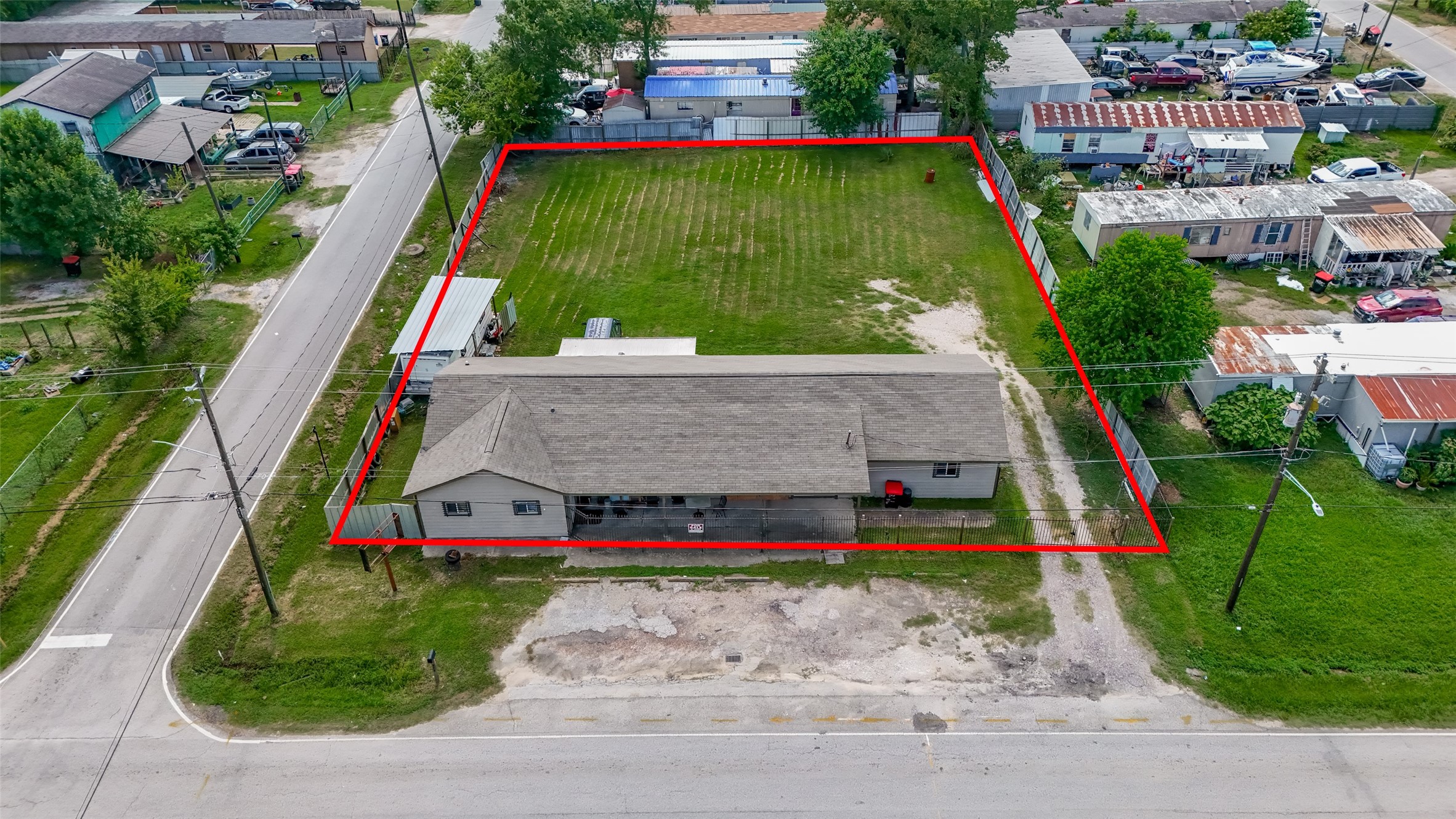 816 Barbara Mae Street Houston, TX 77015 - Photo 18 of 18 an aerial view of a tennis ground with large trees