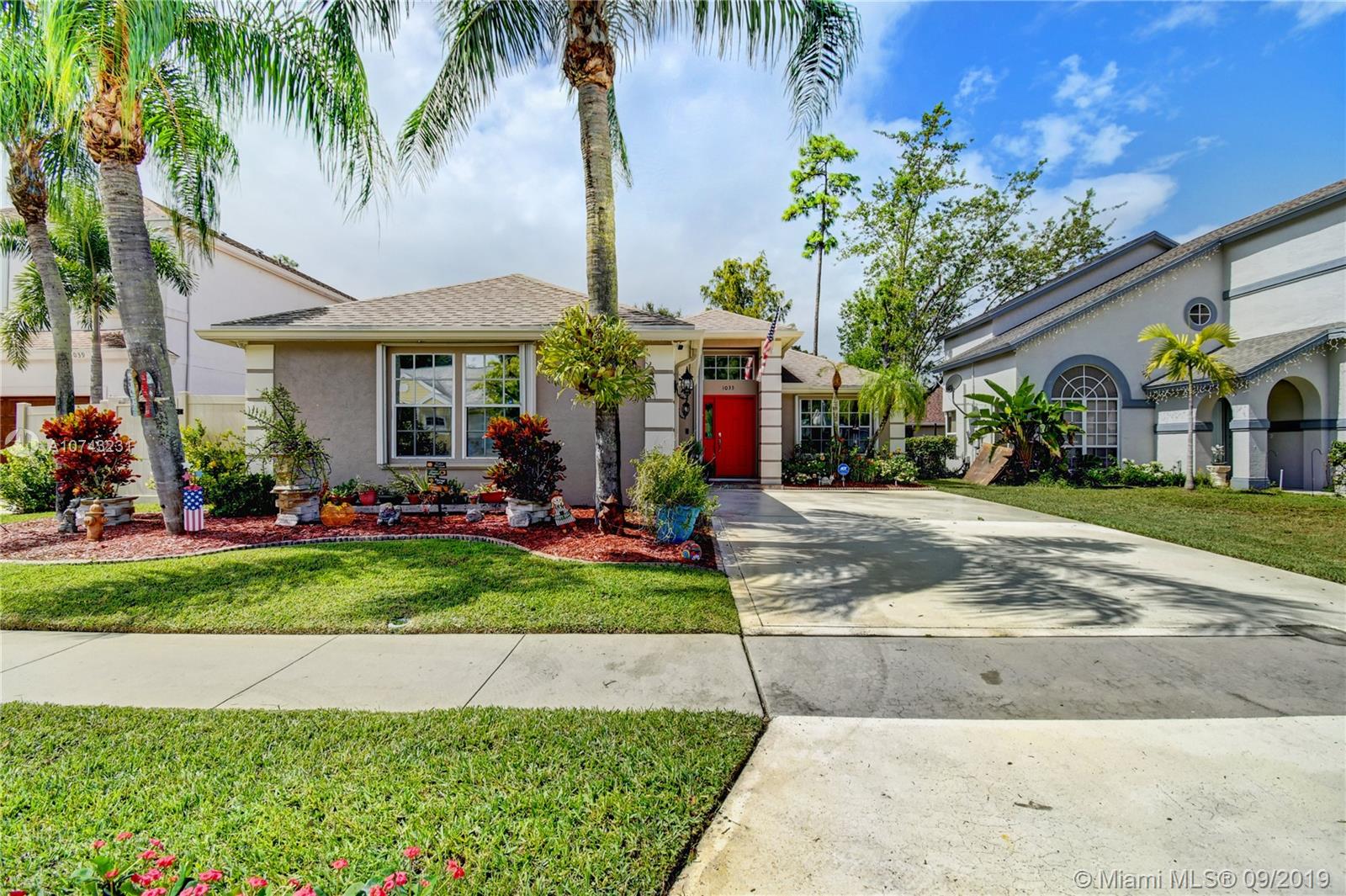 1033 Aviary Road Wellington, FL 33414 - Photo 3 of 36