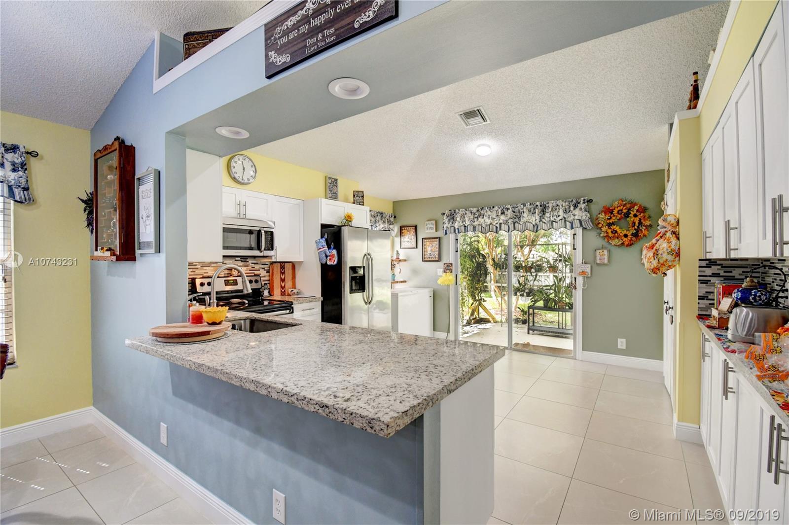 1033 Aviary Road Wellington, FL 33414 - Photo 5 of 36