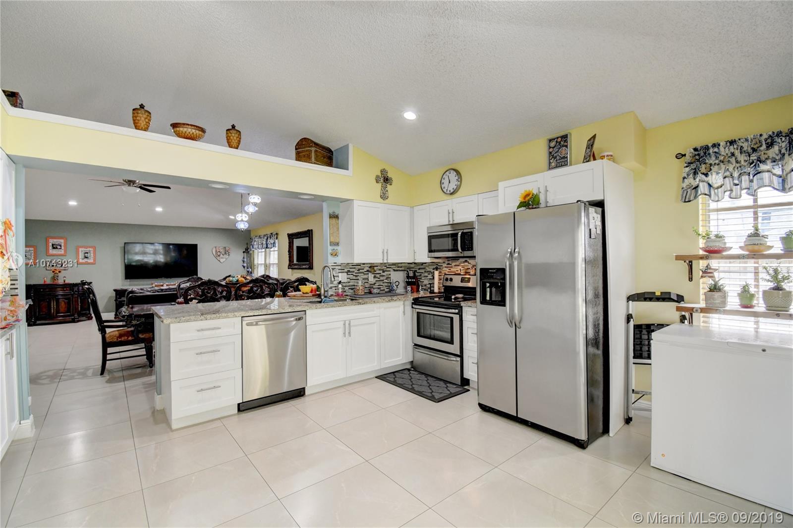 1033 Aviary Road Wellington, FL 33414 - Photo 6 of 36