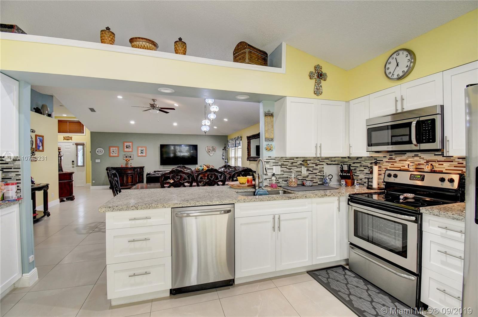 1033 Aviary Road Wellington, FL 33414 - Photo 8 of 36
