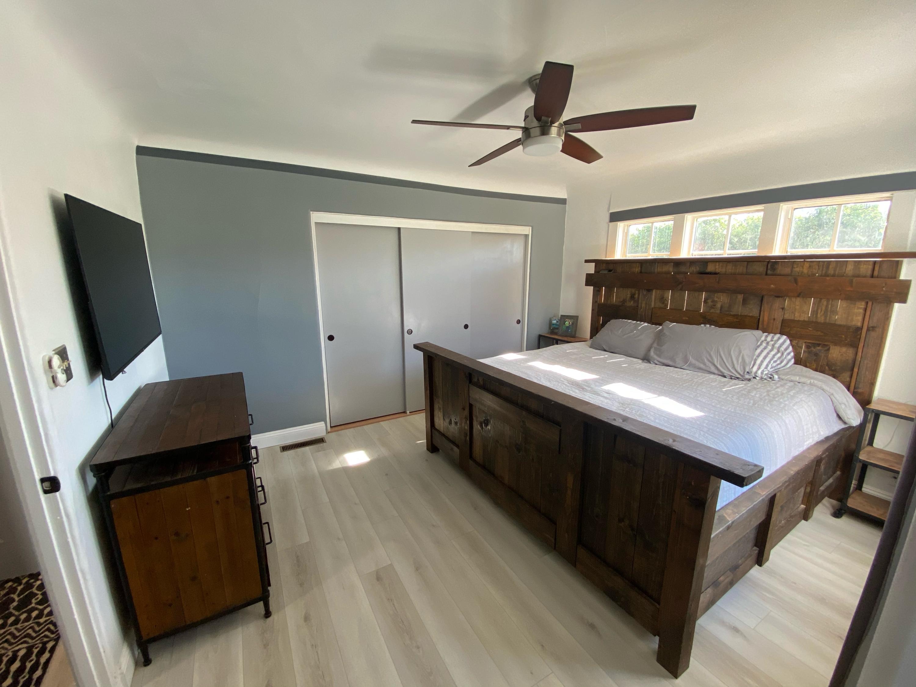 575 Pine Street Solvang, CA 93463 - Photo 12 of 22 a bedroom with a bed and a flat screen tv