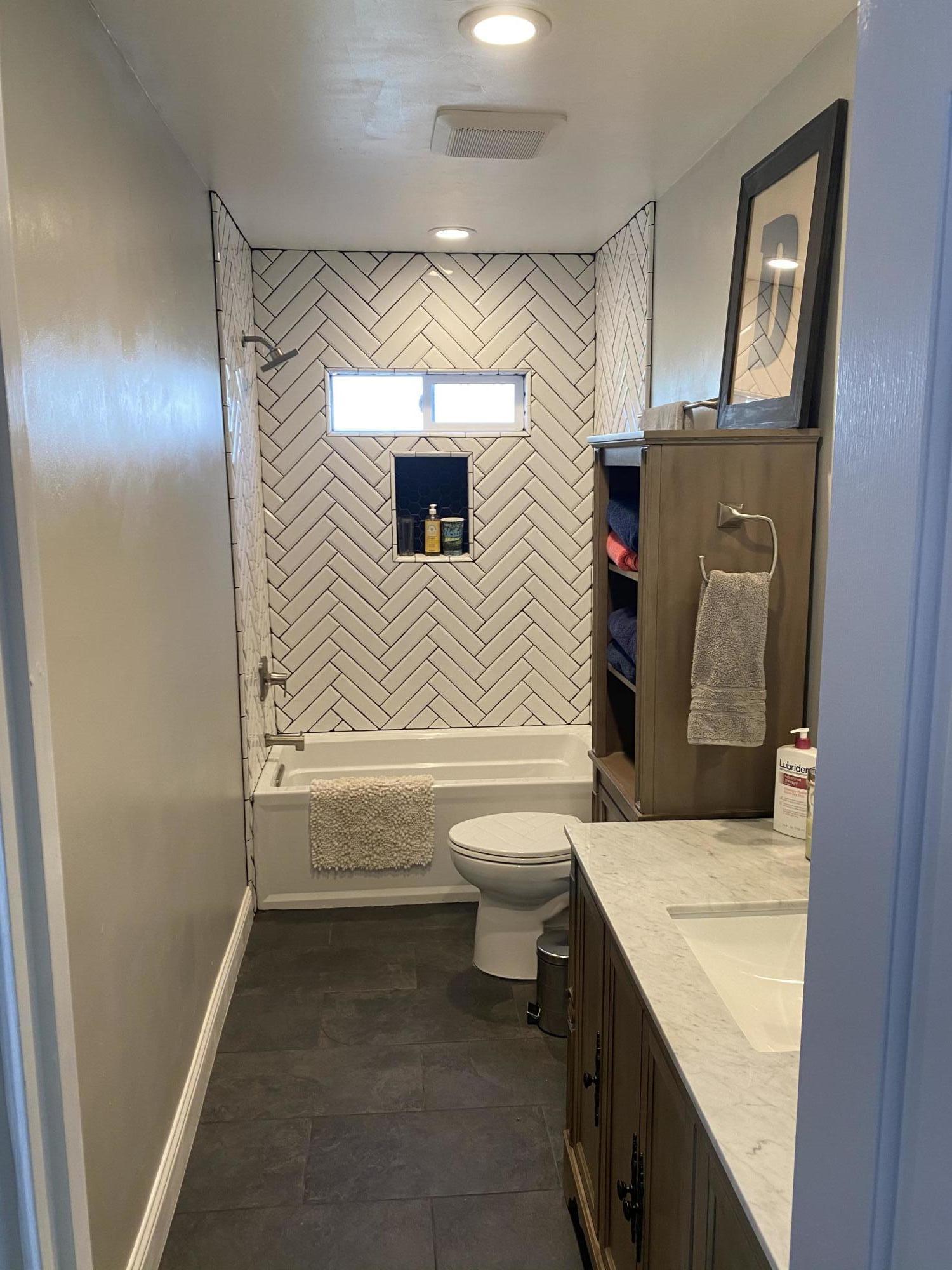 575 Pine Street Solvang, CA 93463 - Photo 16 of 22 a bathroom with a sink a toilet and shower