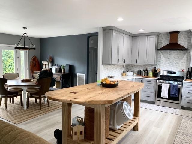 575 Pine Street Solvang, CA 93463 - Photo 4 of 22 a kitchen with a dining table chairs and a kitchen counter top