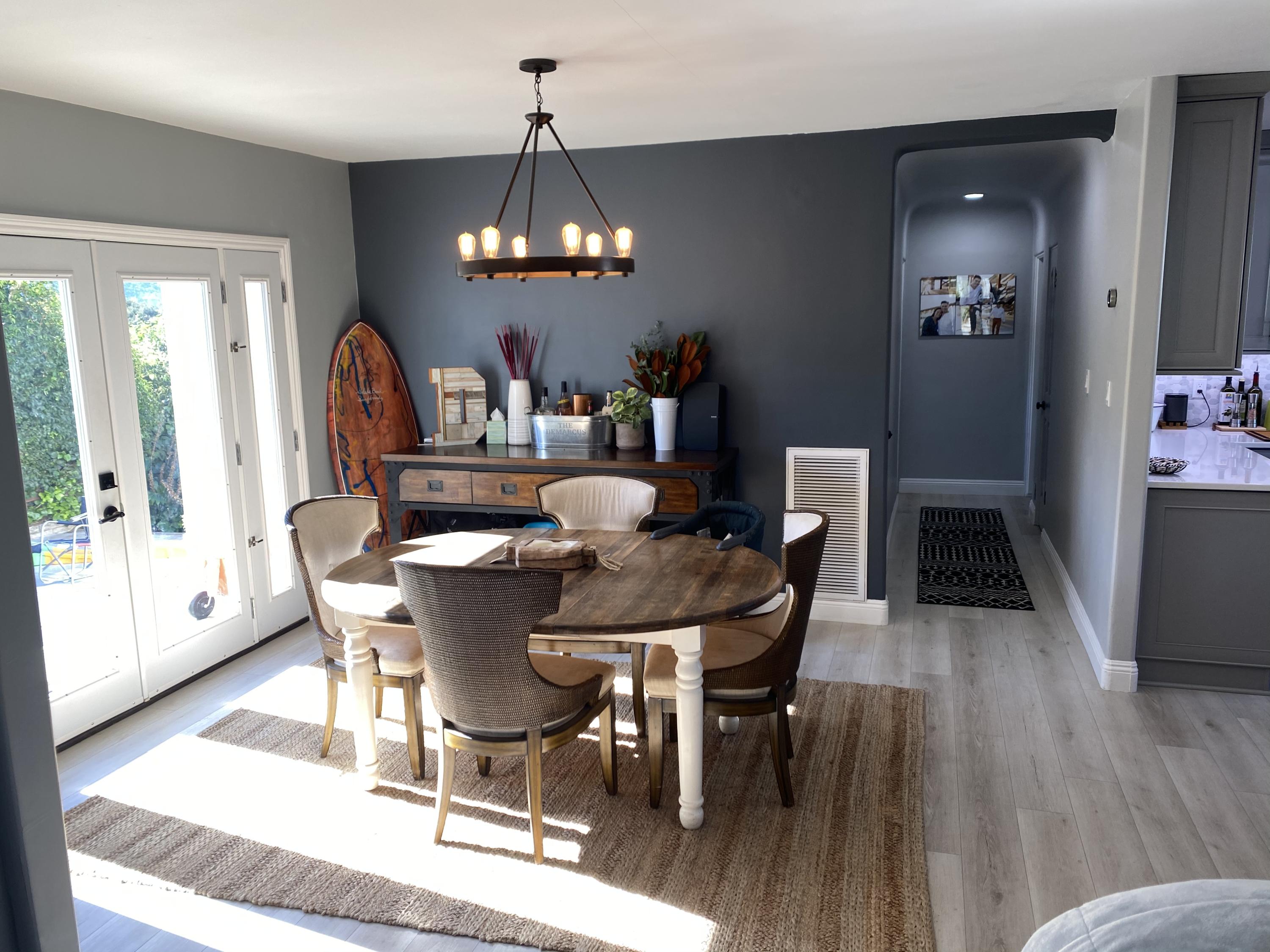 575 Pine Street Solvang, CA 93463 - Photo 5 of 22 a view of a dining room with furniture wooden floor and chandelier