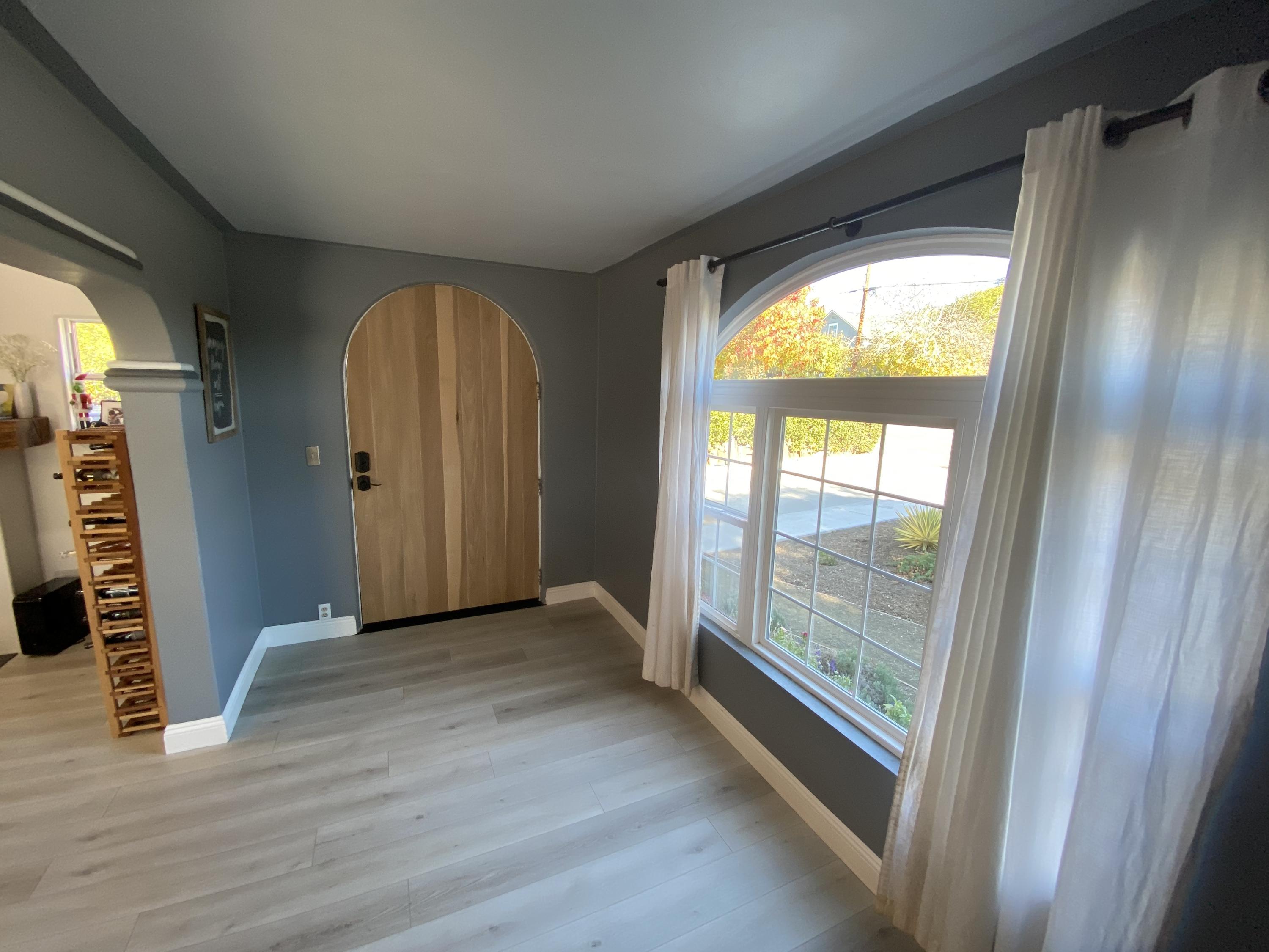 575 Pine Street Solvang, CA 93463 - Photo 7 of 22 a view of empty room with wooden floor and fan