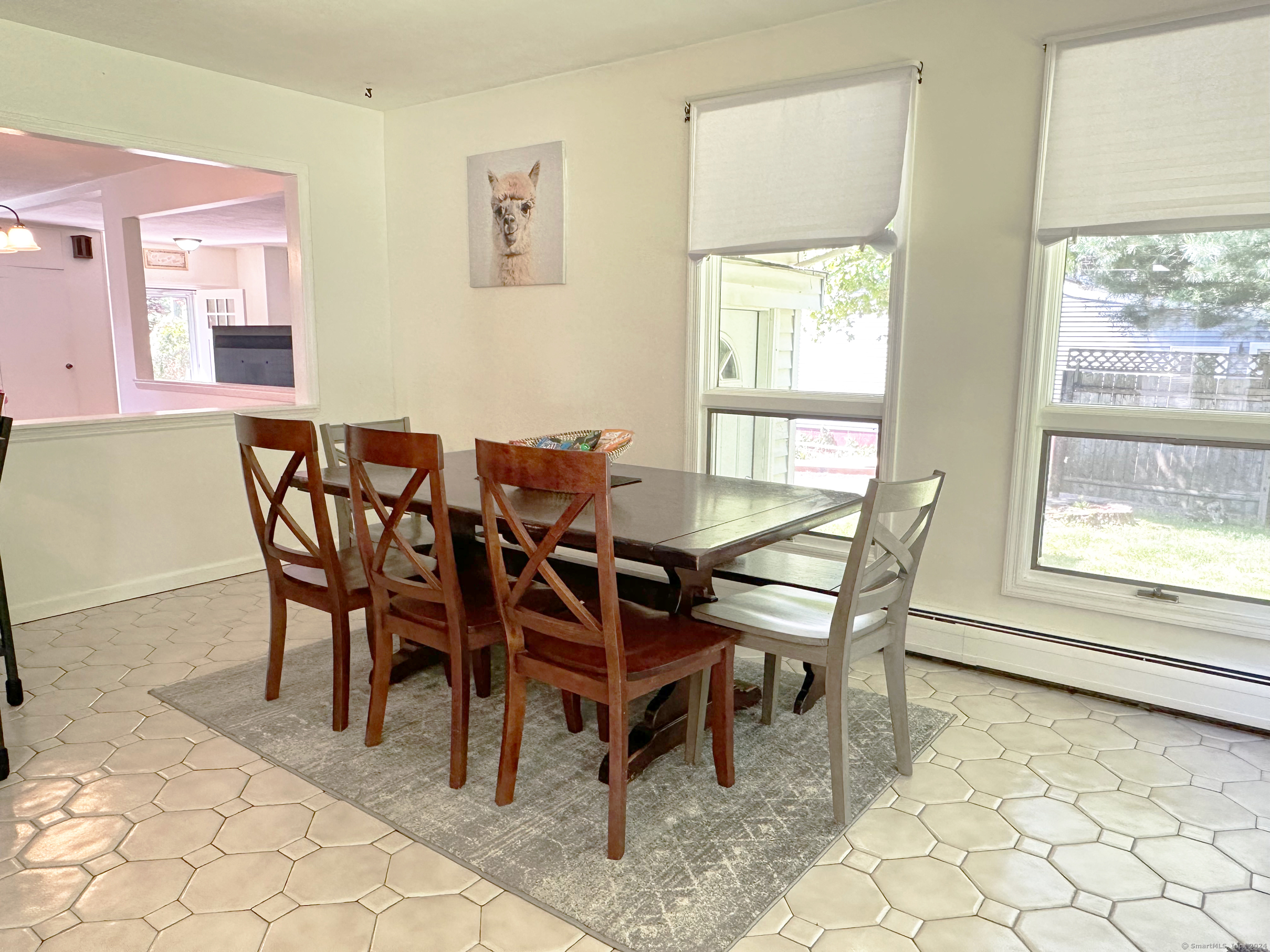 39 Mohawk Drive Norwalk, CT 06851 - Photo 16 of 37 a dining room with furniture and window