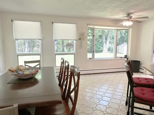 a living room with furniture and window