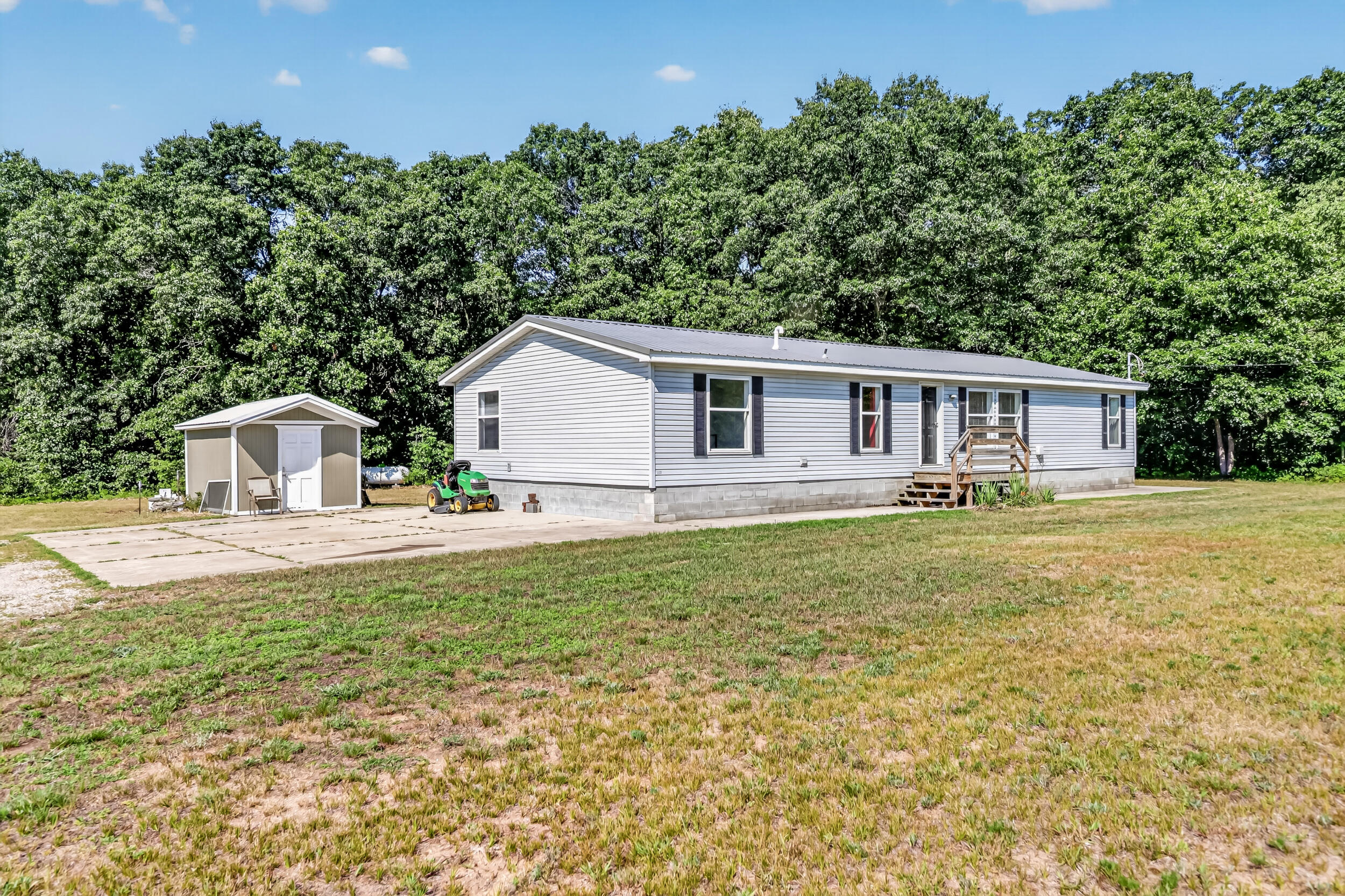 11703 Nichols Road Holton, MI 49425 - Photo 1 of 43 11703 nichols rd-35