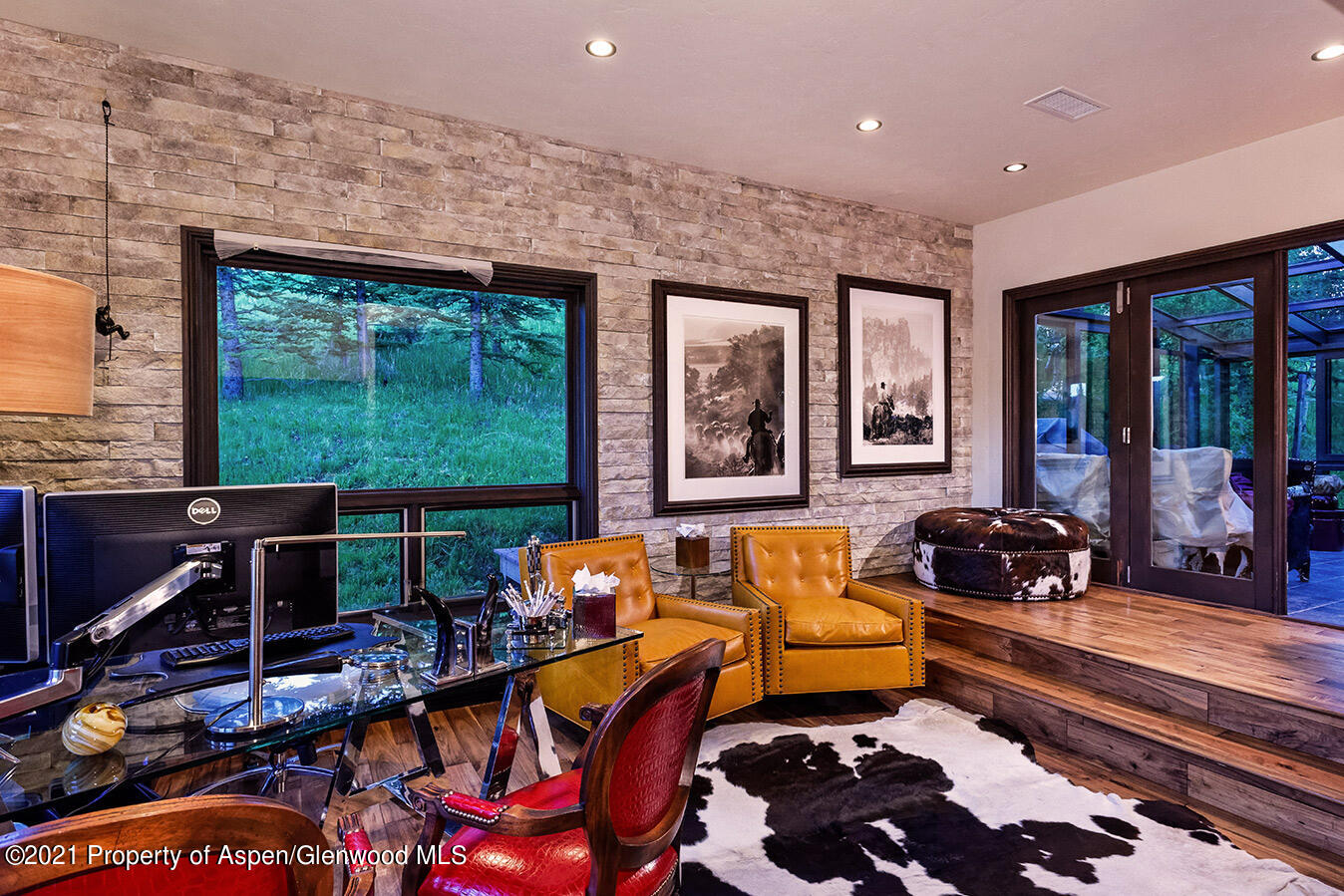 572 North Starwood Road Aspen, CO 81612 - Photo 13 of 26 a room with furniture toys and a large window