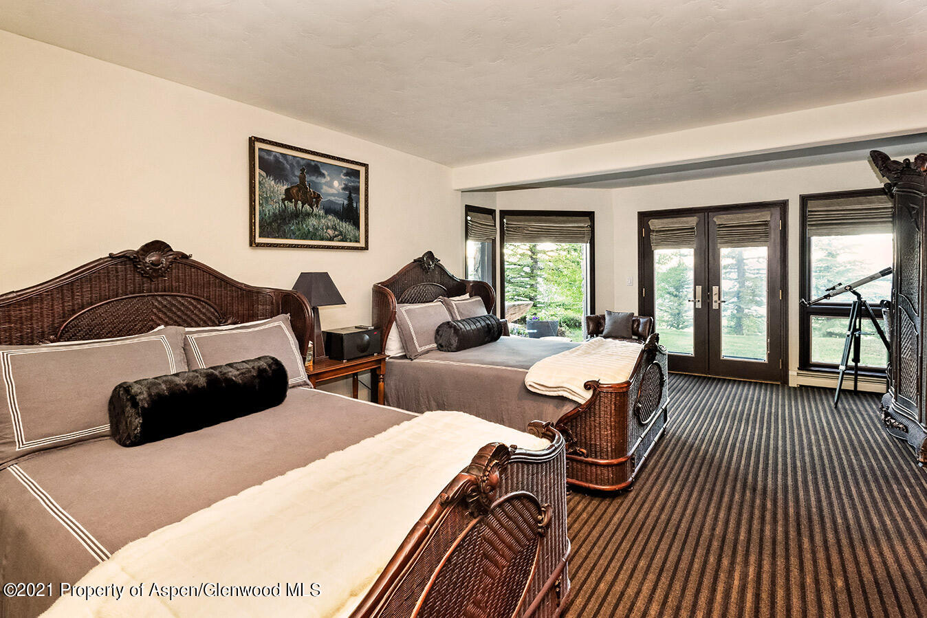 572 North Starwood Road Aspen, CO 81612 - Photo 16 of 26 a bedroom with two beds and a large window