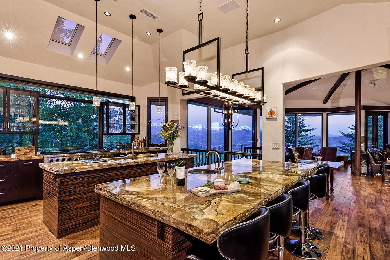 572 North Starwood Road Aspen, CO 81612 - Photo 2 of 26 a view of a dining area with furniture window and wooden floor