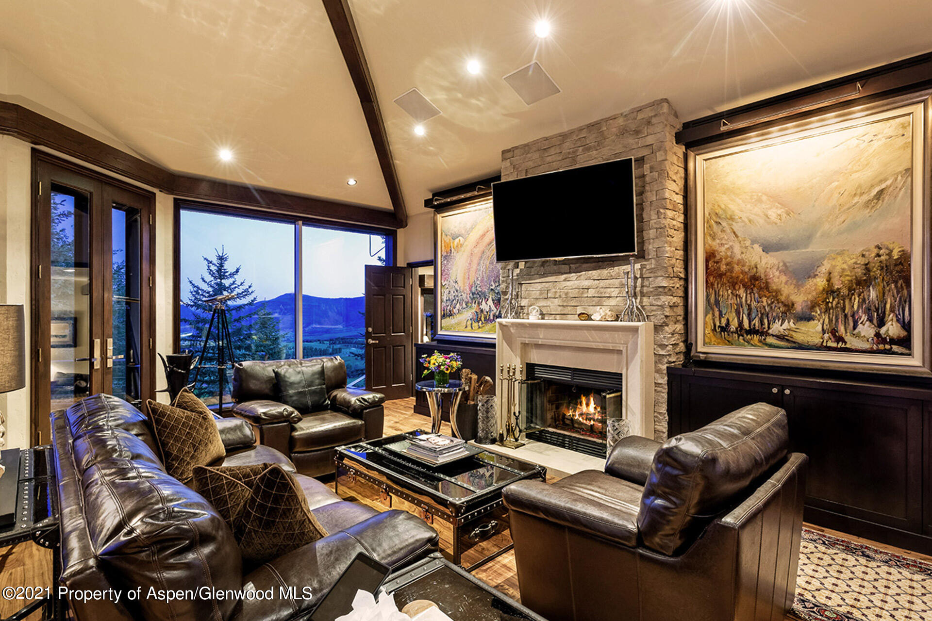 572 North Starwood Road Aspen, CO 81612 - Photo 4 of 26 a living room with furniture fireplace and flat screen tv