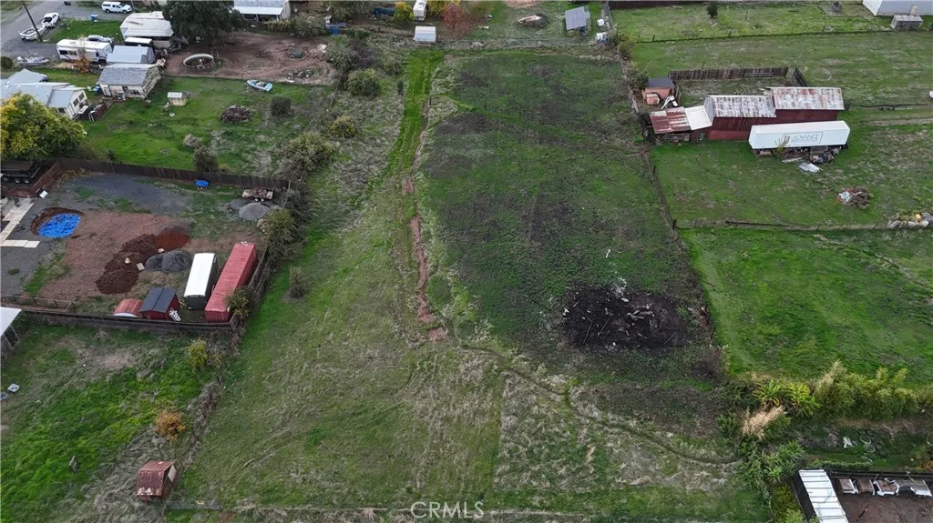 a view of a golf course with a house