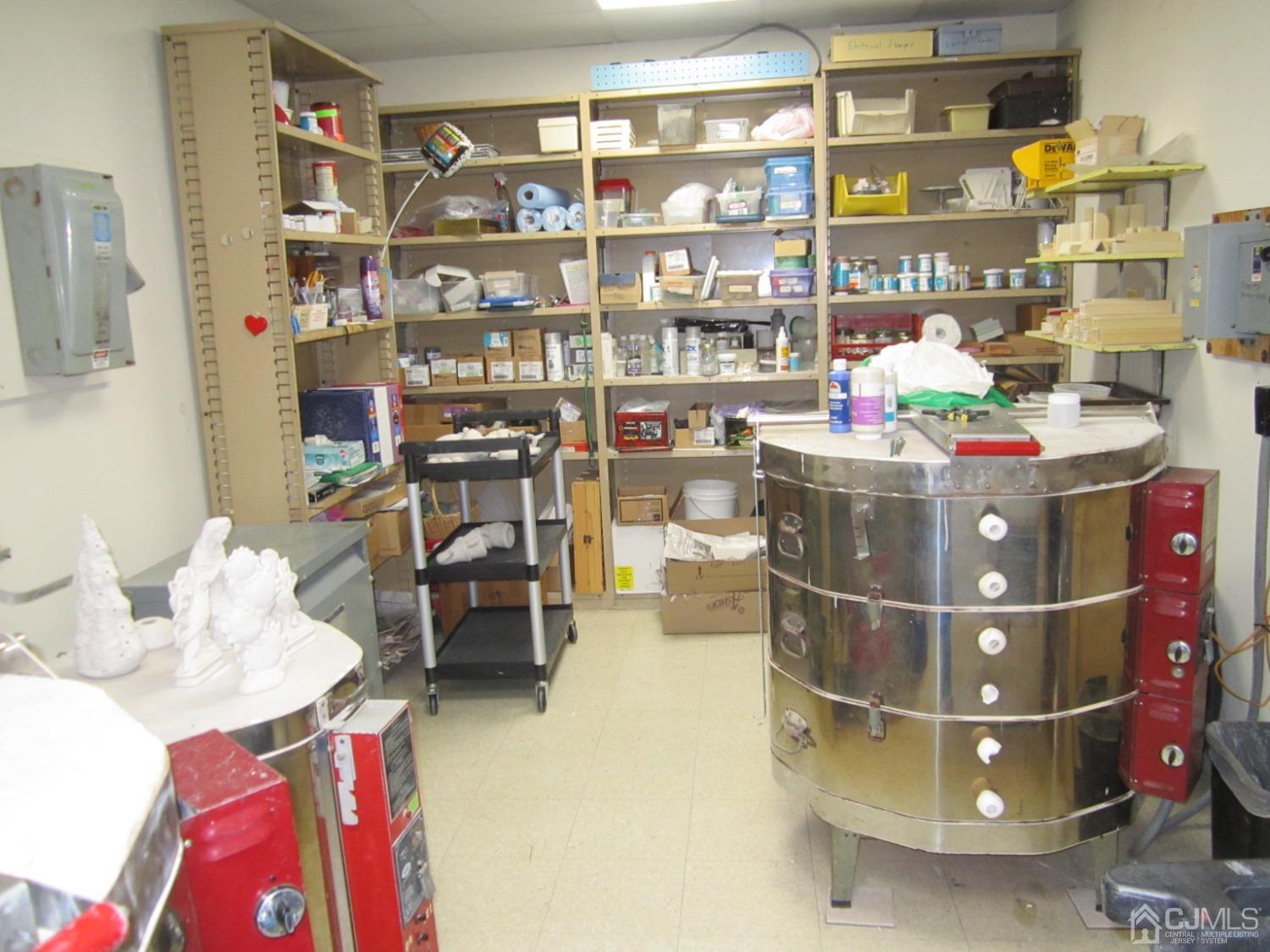 B Glen Road Monroe Township, NJ 08831 - Photo 25 of 28 a room with storage and a lot of shelves