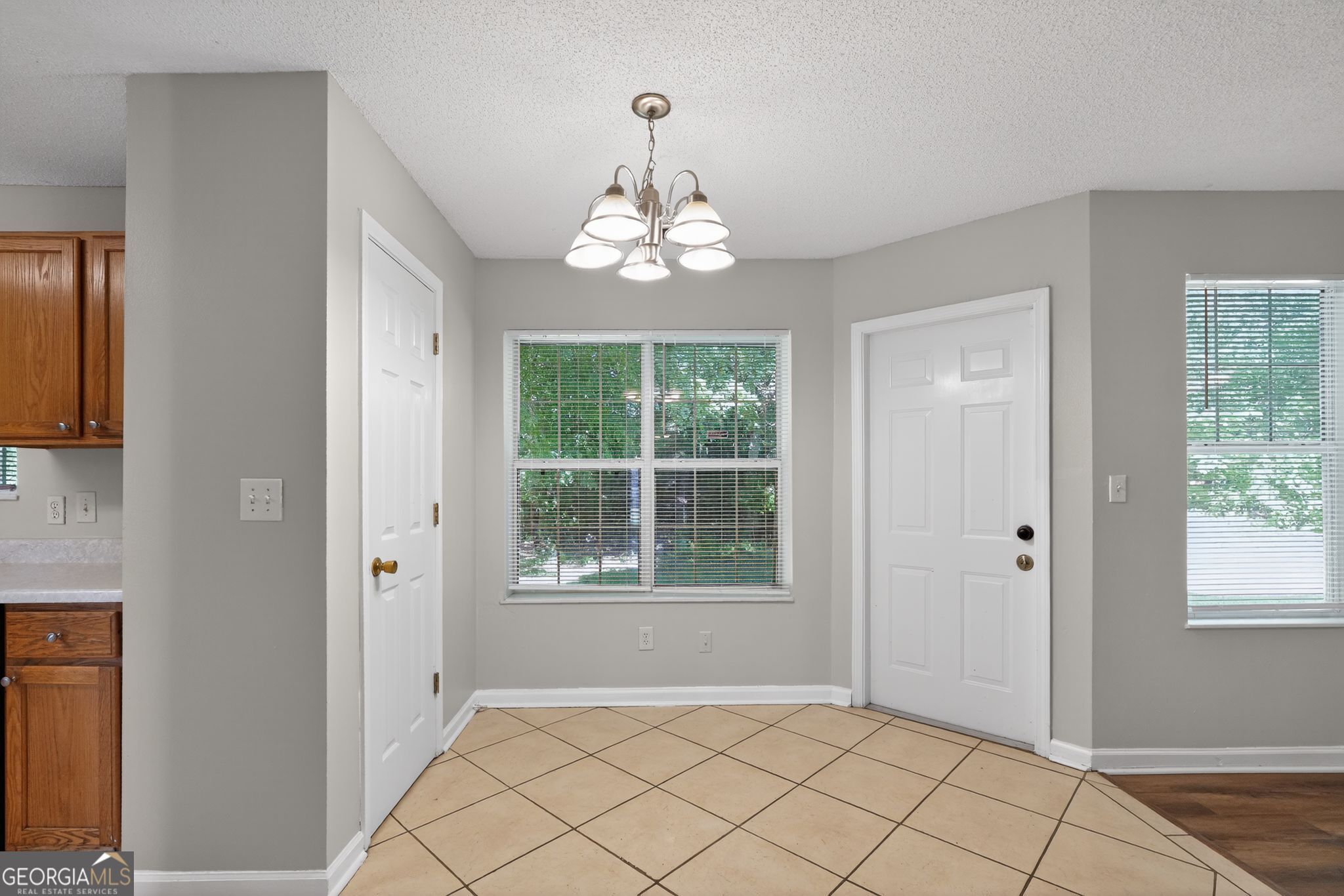 2404 Raven Circle Lithonia, GA 30058 - Photo 15 of 38 a view of an empty room with a window