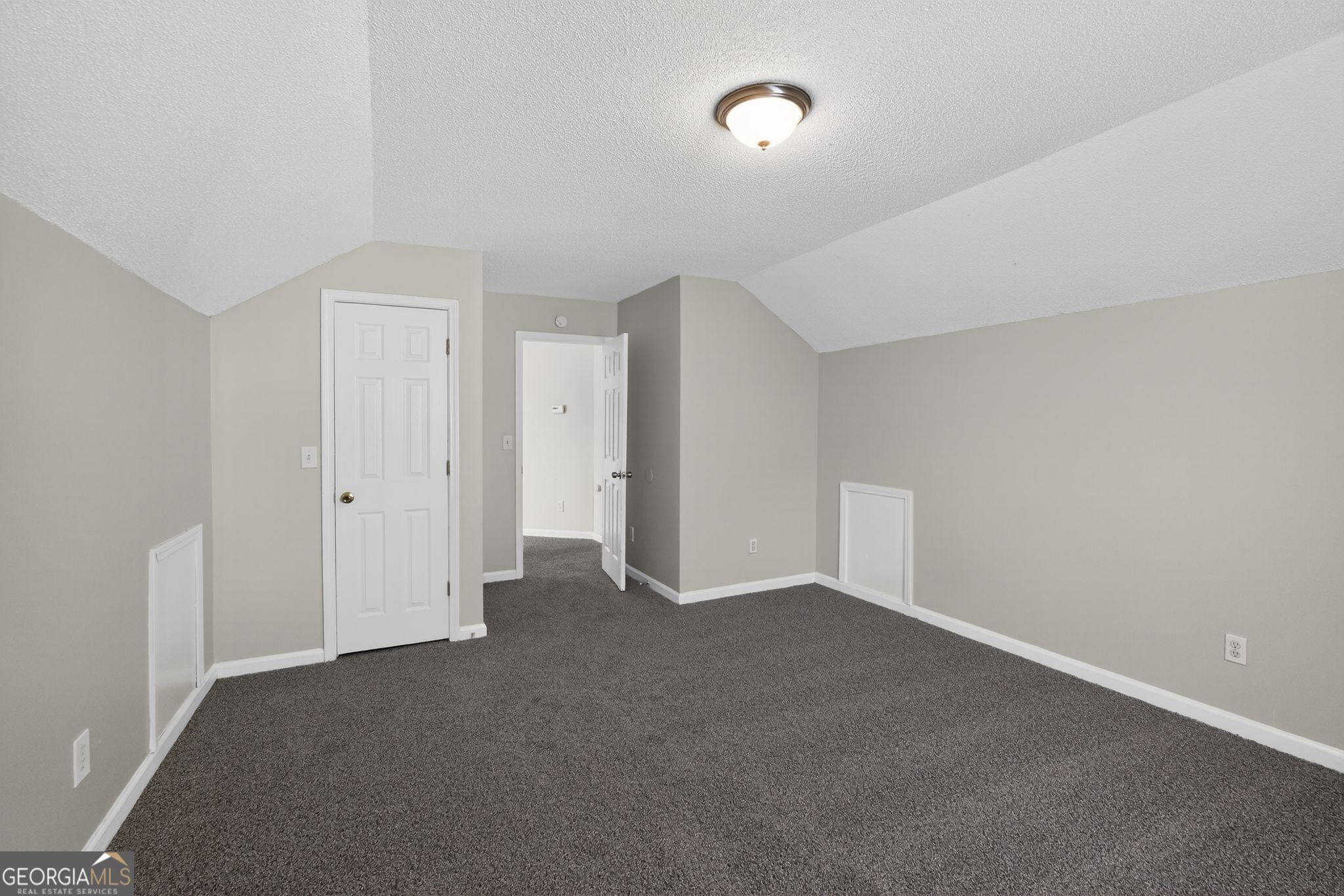 2404 Raven Circle Lithonia, GA 30058 - Photo 31 of 38 a view of an empty room and closet area