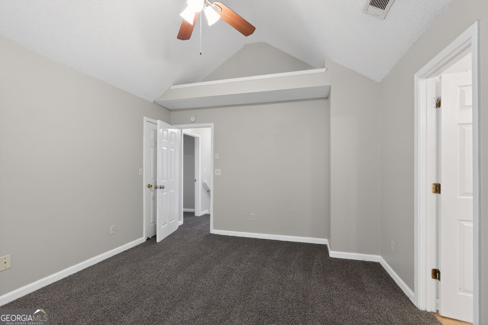2404 Raven Circle Lithonia, GA 30058 - Photo 36 of 38 a view of an empty room