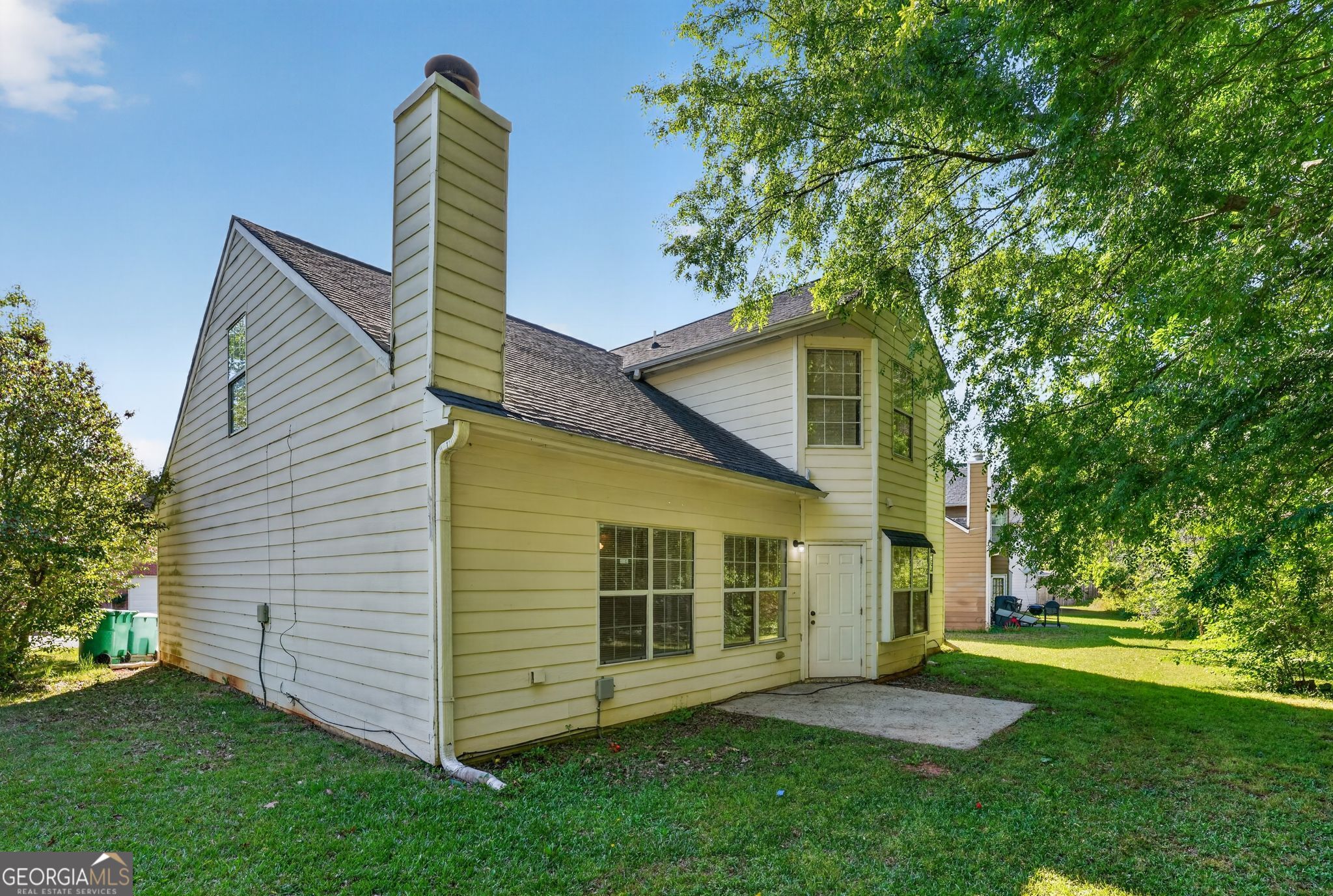 2404 Raven Circle Lithonia, GA 30058 - Photo 37 of 38 a view of a house with a yard