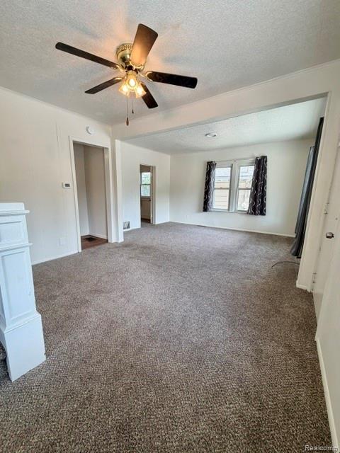 2840 Miller Road Flint, MI 48503 - Photo 8 of 49 Expansive room with neutral carpeting, recessed lighting, and a ceiling fan with integrated lighting