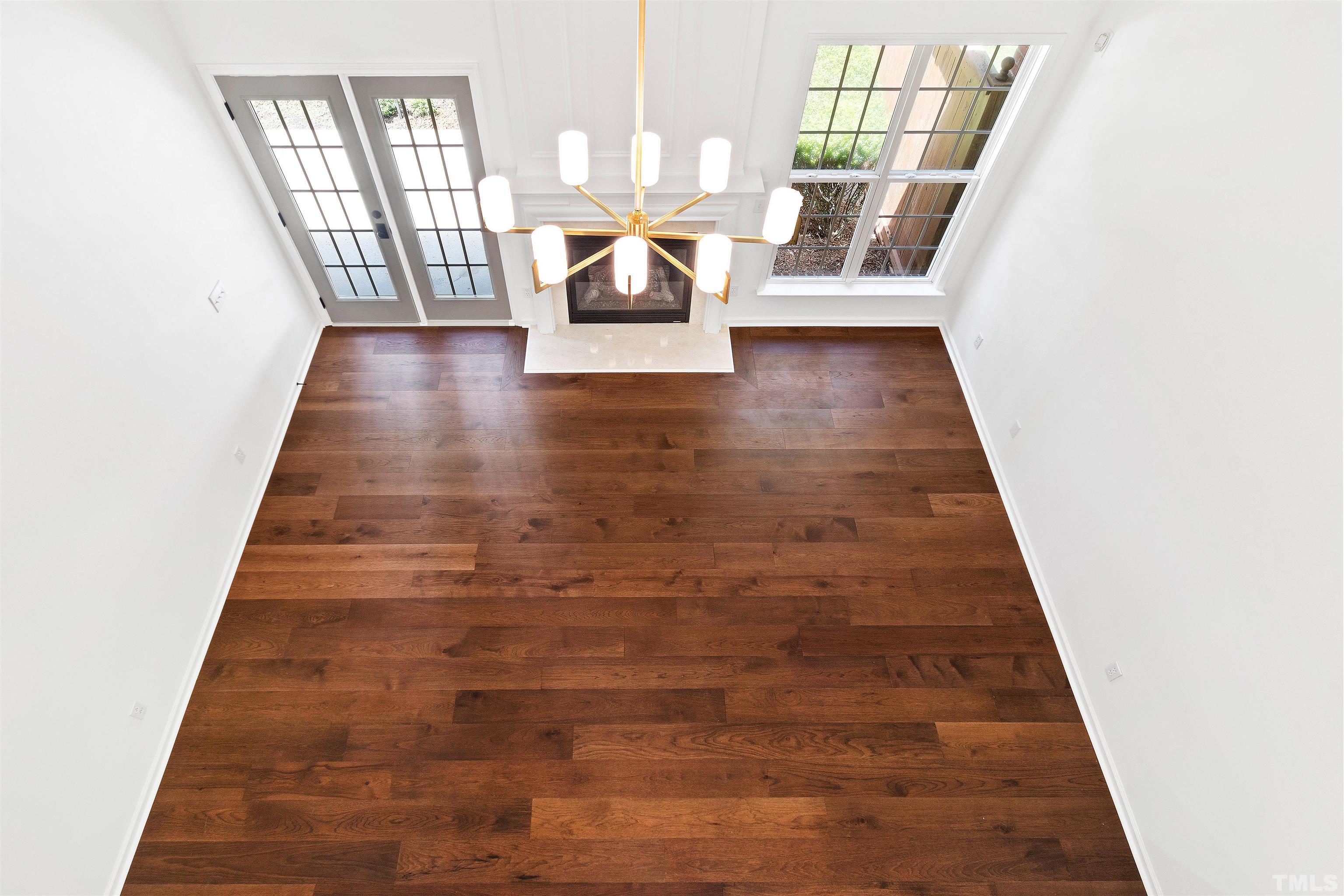 4618 Manassa Pope Lane Raleigh, NC 27612 - Photo 11 of 45 a view of entryway with wooden floor