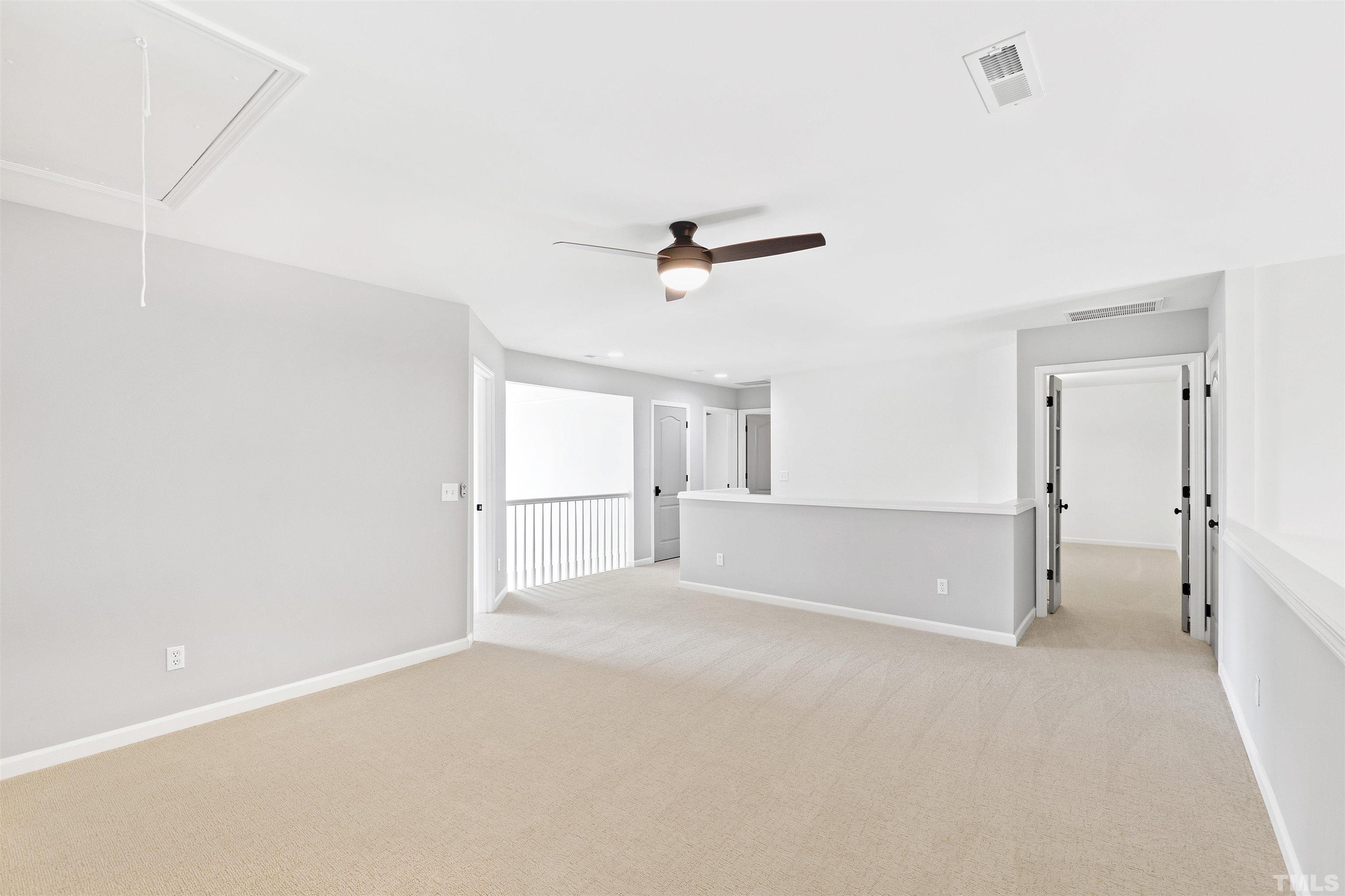 4618 Manassa Pope Lane Raleigh, NC 27612 - Photo 26 of 45 a view of empty room with ceiling fan