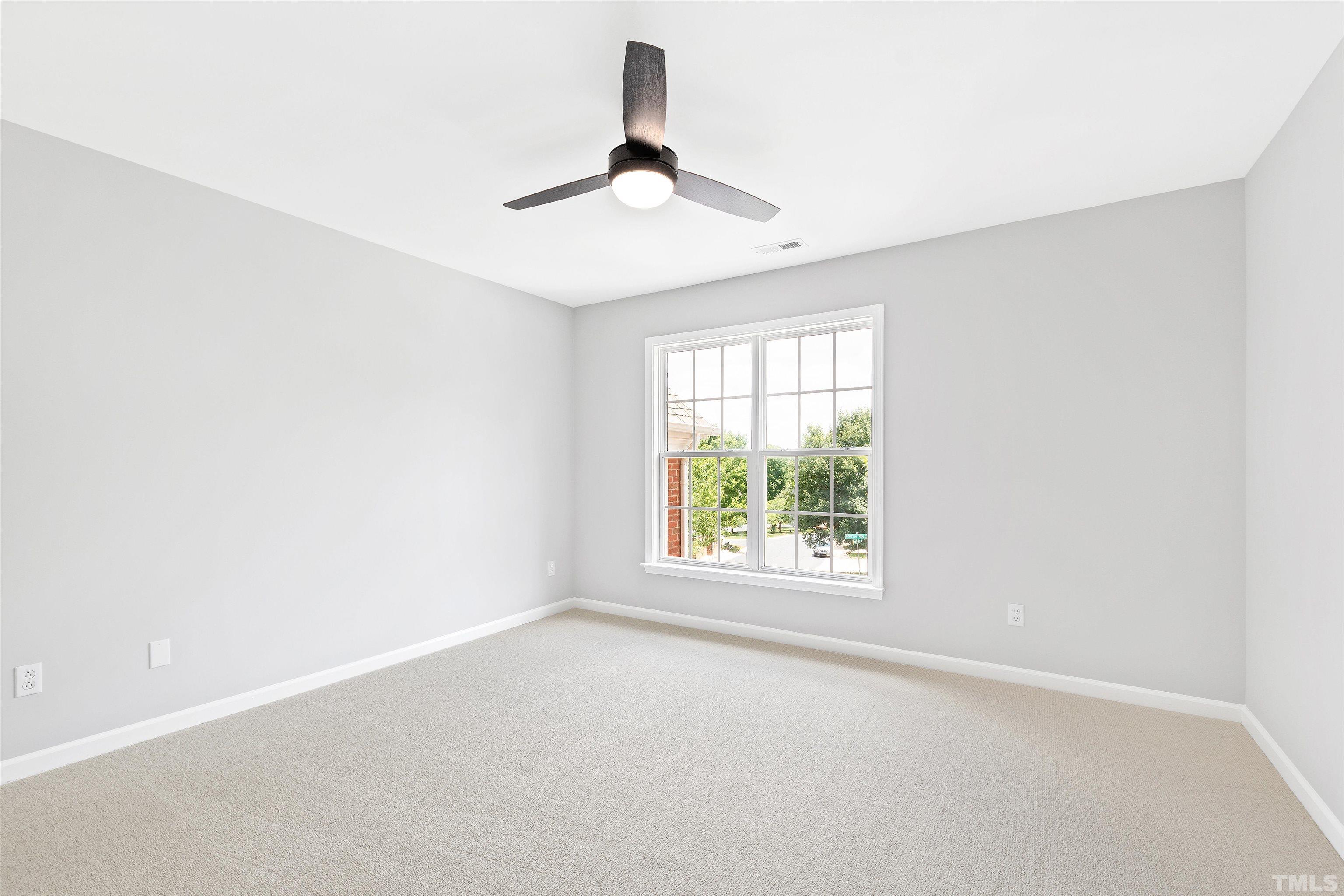 4618 Manassa Pope Lane Raleigh, NC 27612 - Photo 29 of 45 an empty room with a window