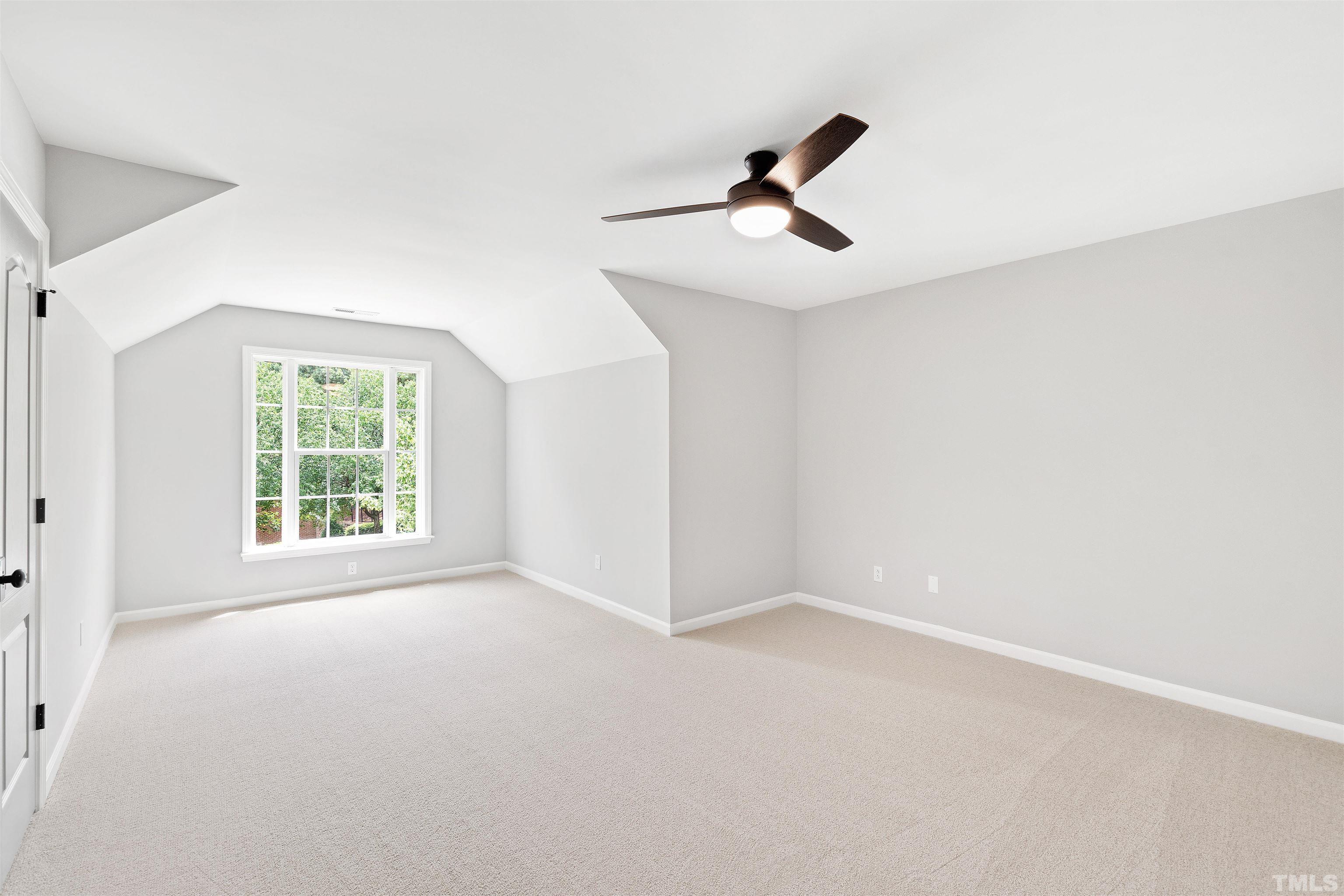 4618 Manassa Pope Lane Raleigh, NC 27612 - Photo 31 of 45 a view of an empty room with windows