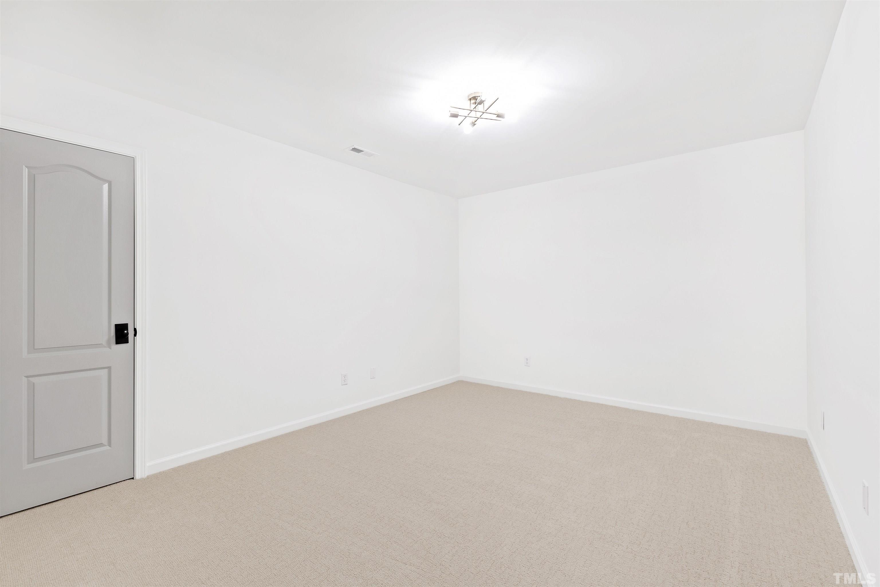 4618 Manassa Pope Lane Raleigh, NC 27612 - Photo 33 of 45 a view of an empty room