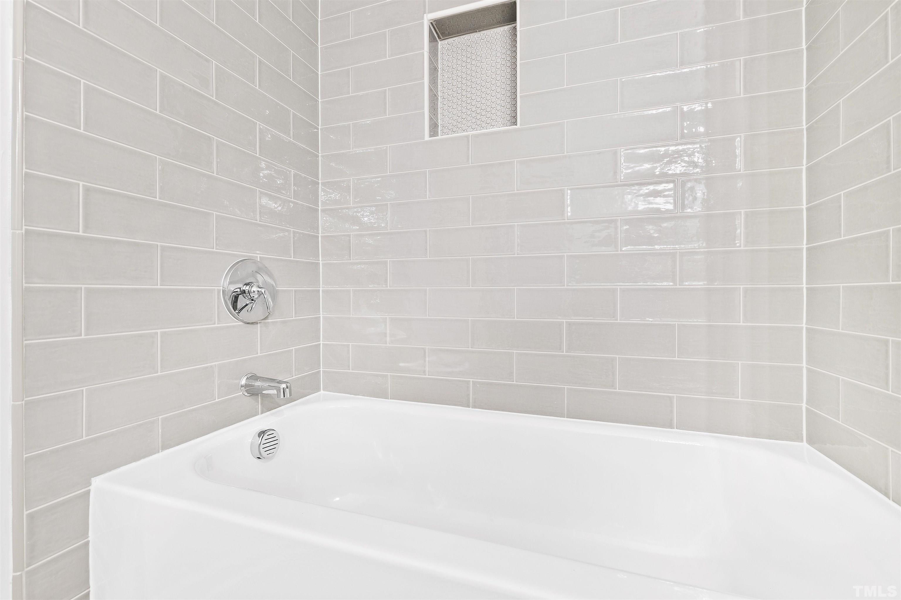 4618 Manassa Pope Lane Raleigh, NC 27612 - Photo 37 of 45 a bathroom with a bathtub