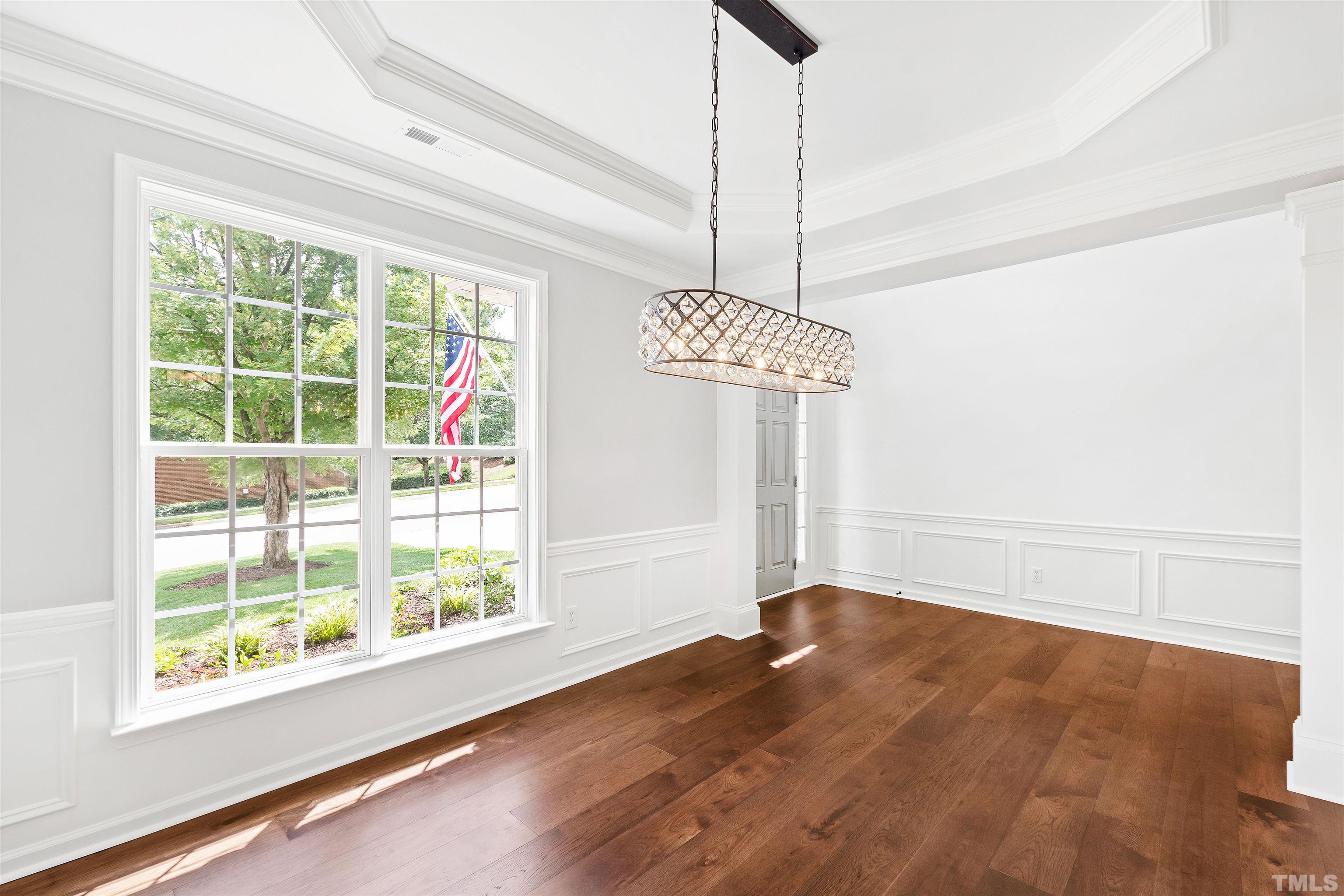 4618 Manassa Pope Lane Raleigh, NC 27612 - Photo 6 of 45 a view of a windows and chandelier in a room