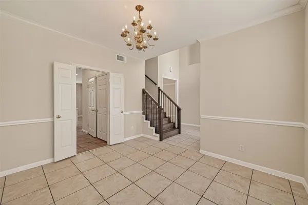 a view of an entryway with stairs