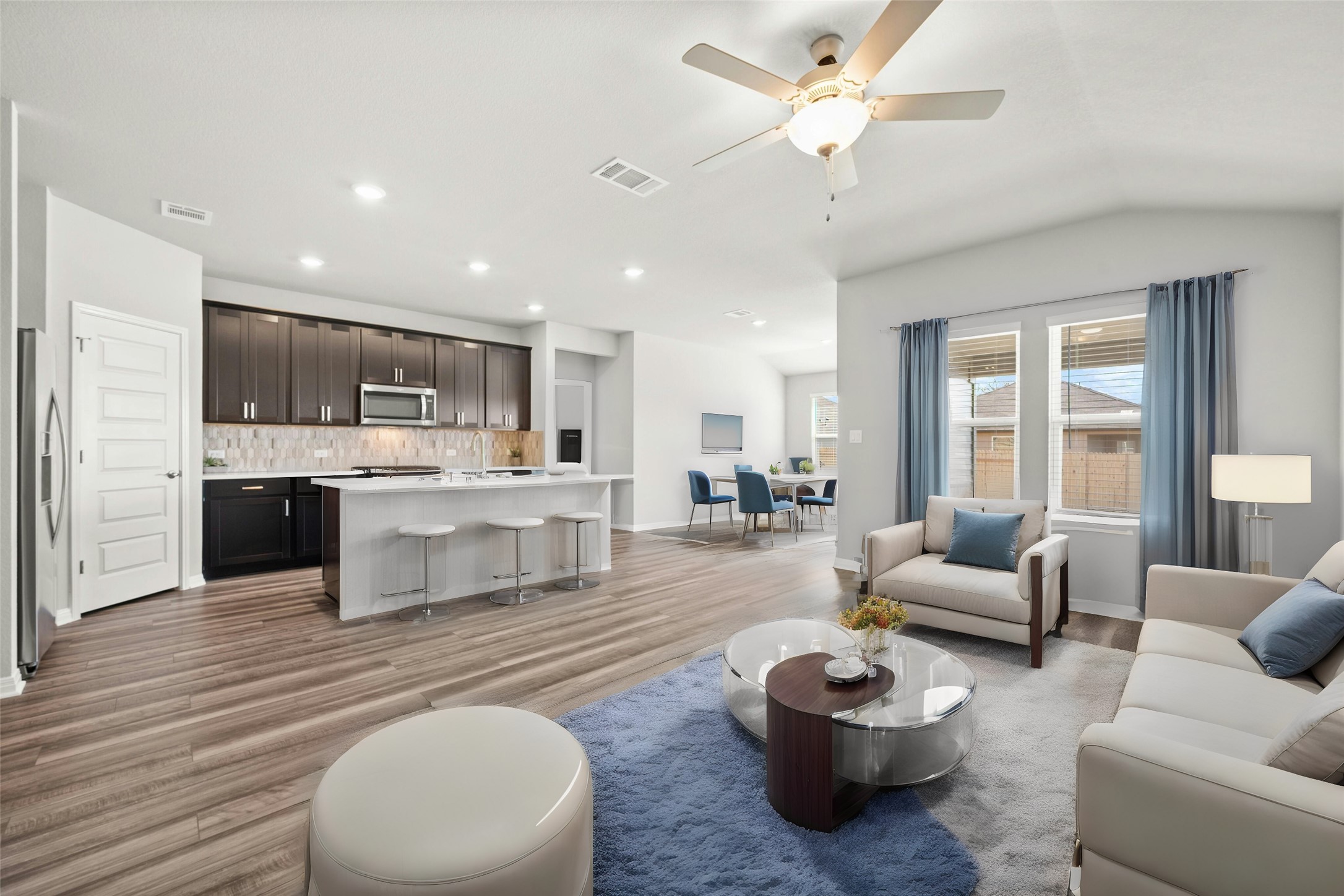 2805 Moyer Lane Round Rock, TX 78665 - Photo 21 of 25 a living room with stainless steel appliances furniture and a kitchen view