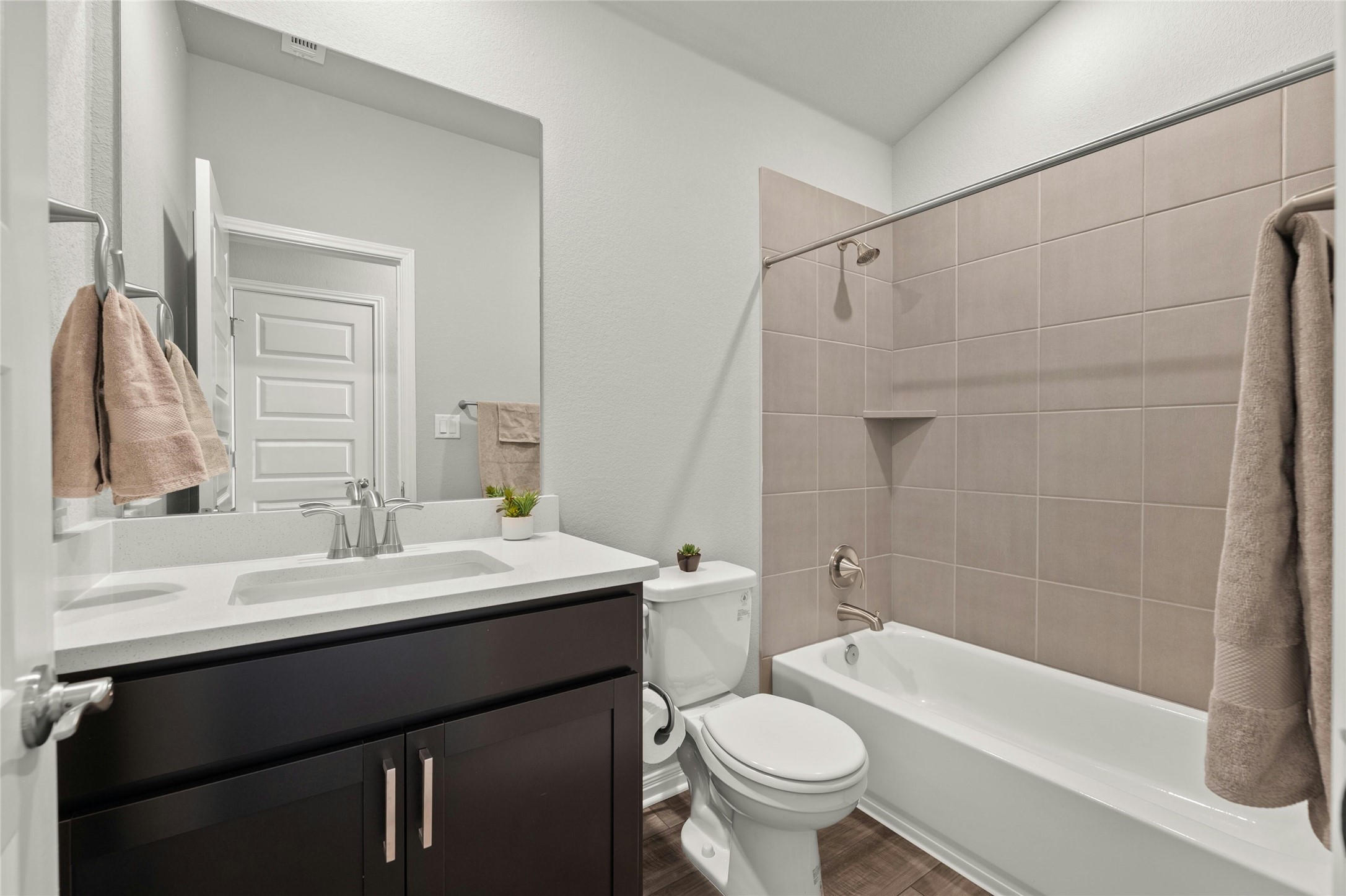 2805 Moyer Lane Round Rock, TX 78665 - Photo 5 of 25 a bathroom with a sink a toilet and shower