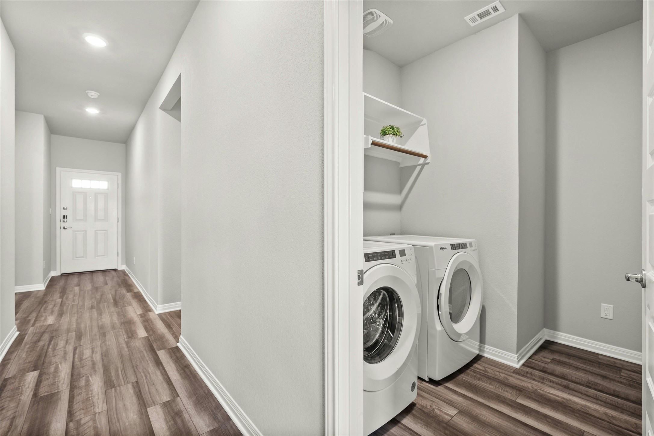2805 Moyer Lane Round Rock, TX 78665 - Photo 8 of 25 a view of a hallway with washer and dryer