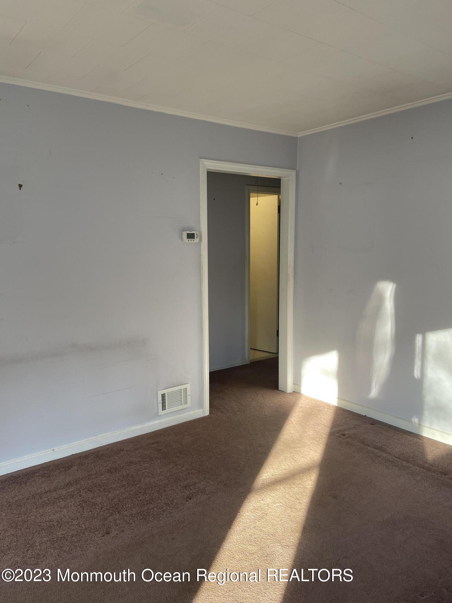 53 Crestview Drive Middletown, NJ 07748 - Photo 12 of 21 a view of a big room with an empty space