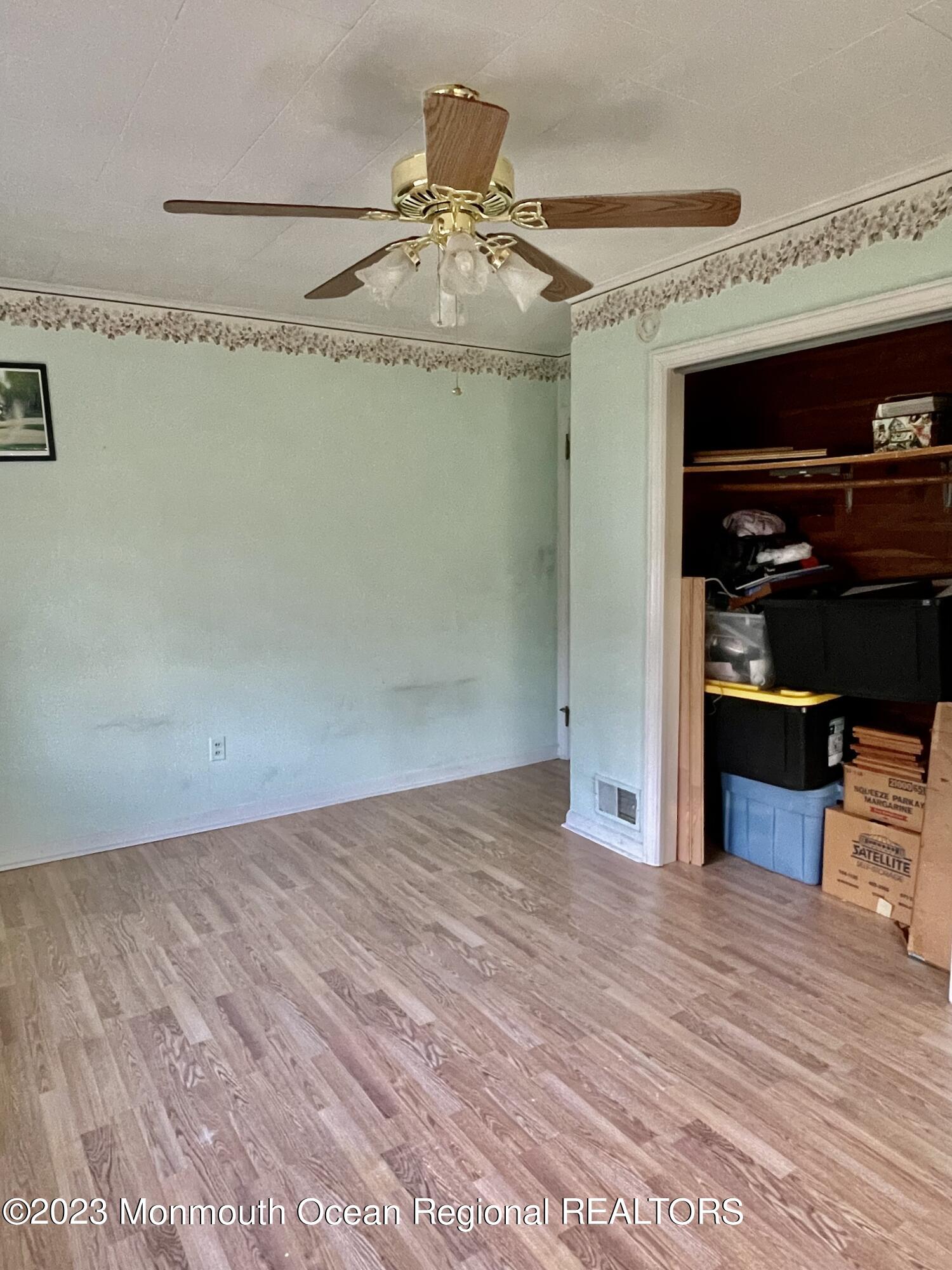 53 Crestview Drive Middletown, NJ 07748 - Photo 16 of 21 a view of a room with wooden floor