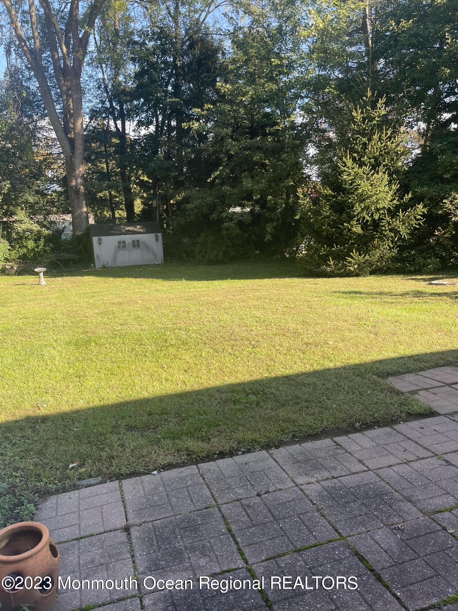 53 Crestview Drive Middletown, NJ 07748 - Photo 2 of 21 a view of an ocean and beach