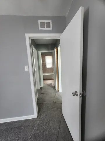 a view of a hallway with a elevator