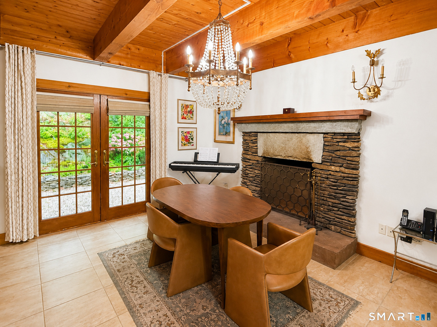 44 Pine Road Colebrook, CT 06021 - Photo 8 of 40 a living room with furniture a fireplace and a table