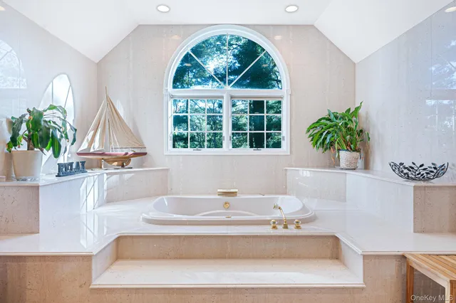 a bathroom with a sink and a bathtub