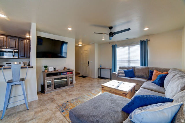 3853 South Red Valley Circle, Unit 22A1 Moab, UT 84532 - Photo 10 of 28 Living area with a ceiling fan and recessed lighting